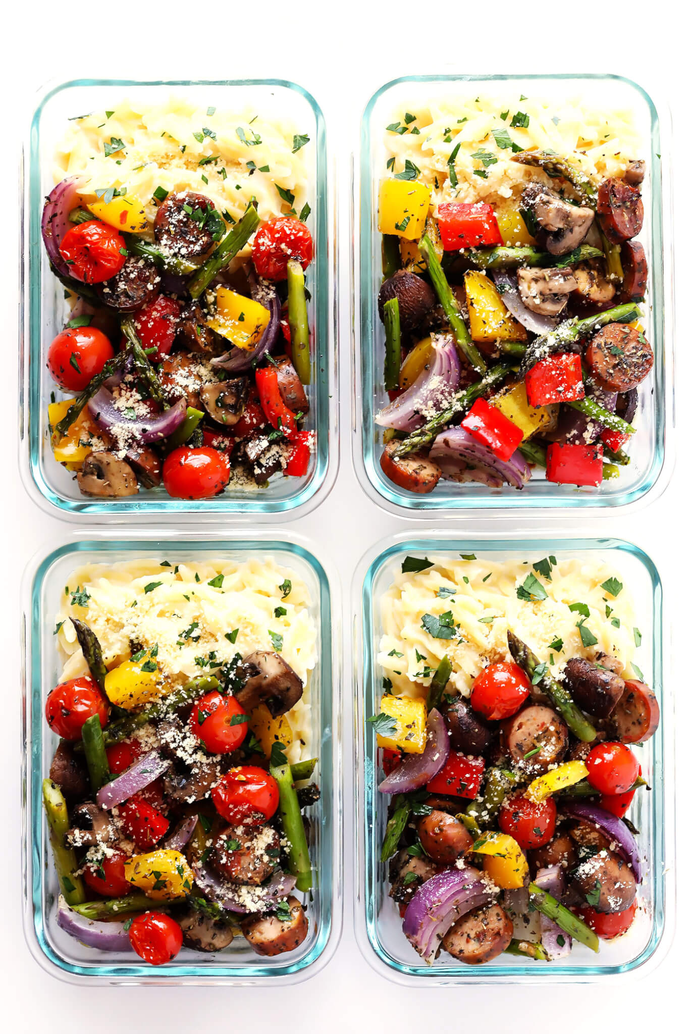 LOVE these Italian Sausage and Veggie Bowls! They're made with Italian roasted vegetables (such as tomatoes, asparagus, peppers, onions, mushrooms), paired with Parmesan Garlic Orzo Pasta, and perfect for easy lunch or dinner meal prep. So delicious! | gimmesomeoven.com