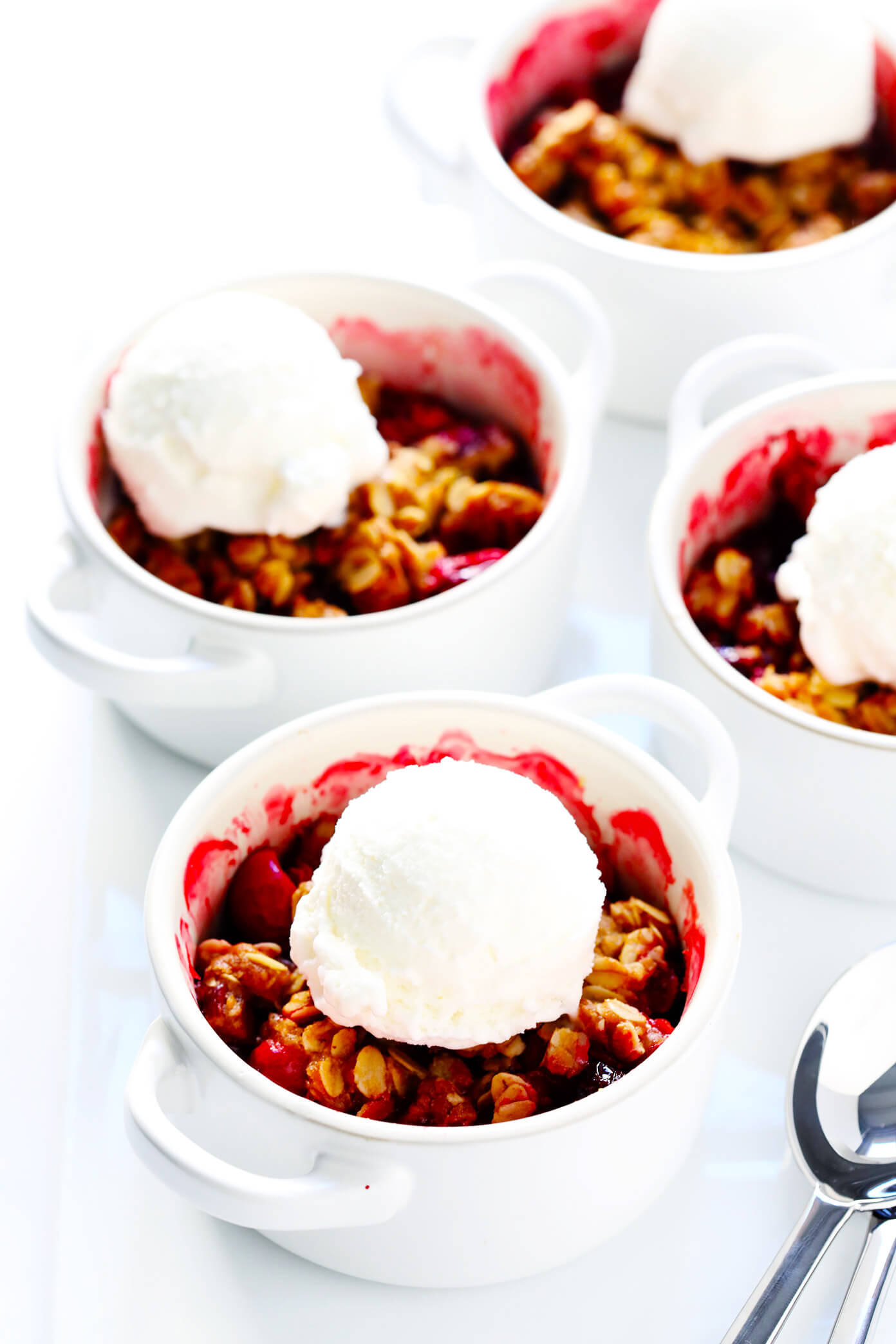 LOVE this easy Cranberry Crisp recipe! It's the perfect holiday dessert for Thanksgiving or Christmas, it's made with a crunchy butter pecan oatmeal topping, and it's the perfect use for your leftover fresh cranberries!