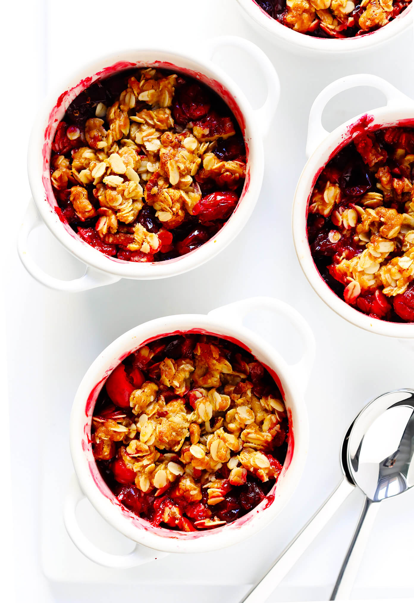LOVE this easy Cranberry Crisp recipe! It's the perfect holiday dessert for Thanksgiving or Christmas, it's made with a crunchy butter pecan oatmeal topping, and it's the perfect use for your leftover fresh cranberries!